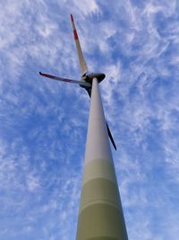 Low angle view of wind turbine against sky