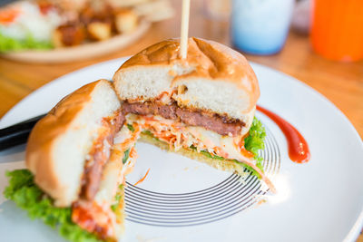 Close-up of sandwich served in plate on table