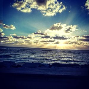 Scenic view of sea against sky at sunset