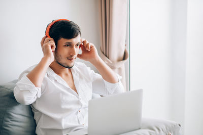 Young man using mobile phone