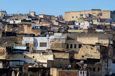 High angle view of old buildings against clear sky