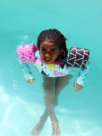 Portrait of girl in swimming pool