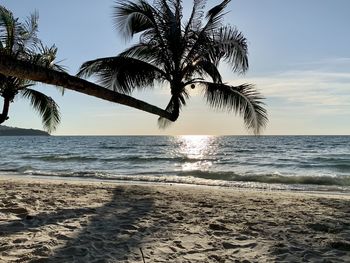 Scenic view of sea against sky at sunset