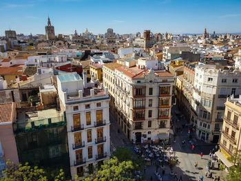 High angle view of buildings in city against sky