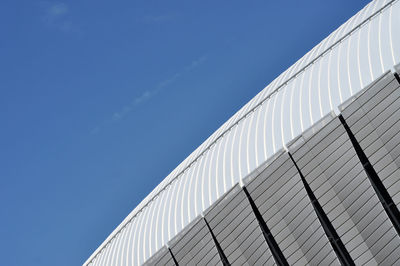 Low angle view of building against blue sky