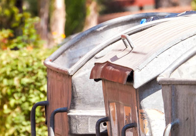 Close-up of empty bench on table in park