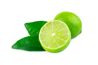 Close-up of lemon slice against white background