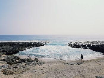 Scenic view of sea against clear sky