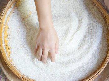 High angle view of woman preparing food in bowl