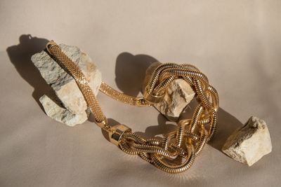 Close-up of pearl jewelry on table