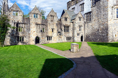 View of old building in lawn