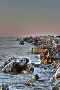 Scenic view of sea against sky during sunset