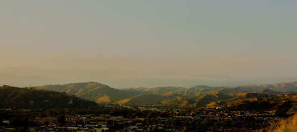 Scenic view of landscape against sky during sunset