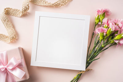 High angle view of white flower on table