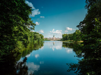 Scenic view of lake against blue sky