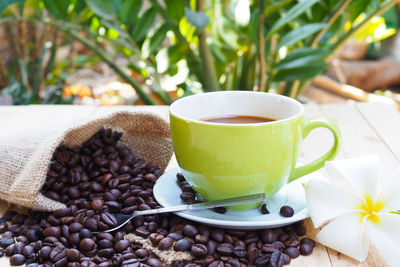 Close-up of coffee cup on table