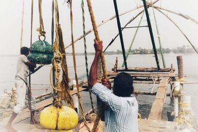 Fishermen fishing in sea