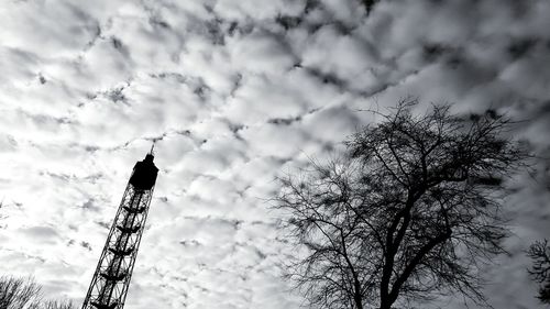 Low angle view of silhouette tree against sky