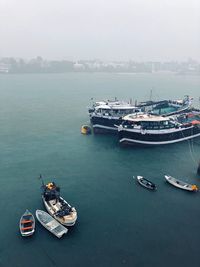 High angle view of boats in sea against clear sky