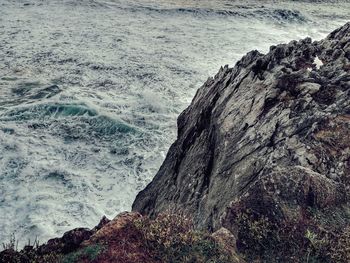 Scenic view of rocks in sea