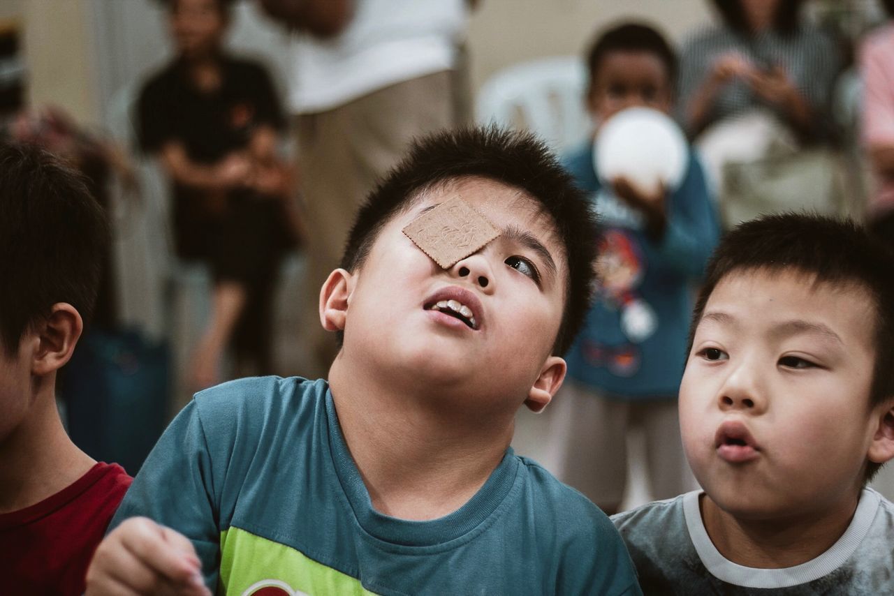 PORTRAIT OF BOY AND PEOPLE