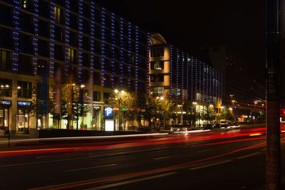 Blurred motion of car on road at night