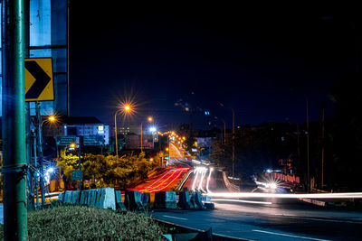 Illuminated street at night