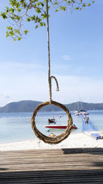View of ship on beach against sky