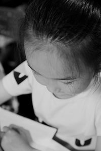 Close-up of girl studying in classroom
