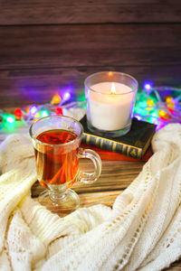 Close-up of tea light candles on table