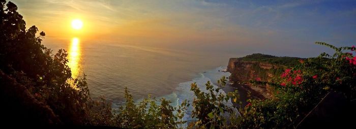 Scenic view of sea at sunset