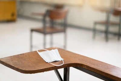 Close-up of empty chairs and table in restaurant