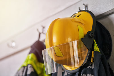 Cropped image of man holding hardhat