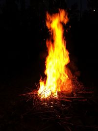 Bonfire on field at night