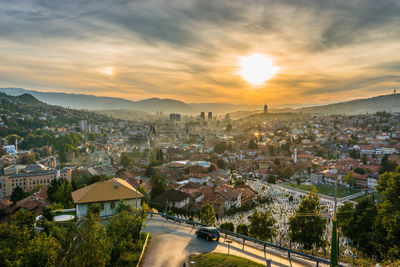 High angle view of townscape against sky during sunset