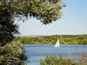 Scenic view of lake against clear sky