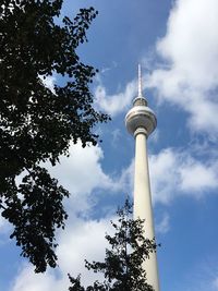 Low angle view of fernsehturm against sky in berlin