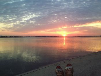 Scenic view of sunset over lake