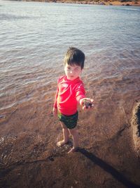 Full length of boy on beach