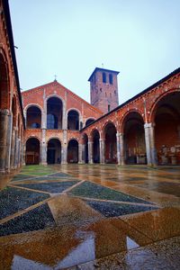 Low angle view of historical building against clear blue sky