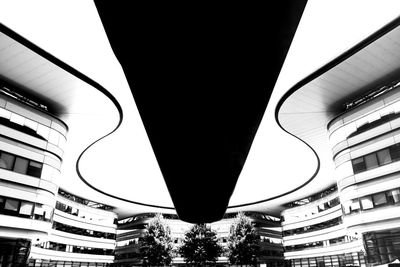 Low angle view of illuminated buildings in city