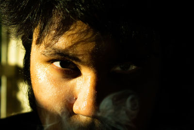 Close-up portrait of a serious young man