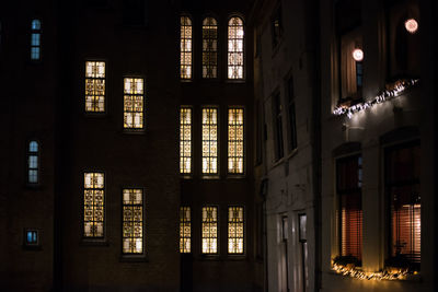 Illuminated buildings in city at night