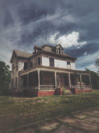 Low angle view of old building against sky