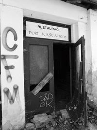 Information sign on old abandoned door