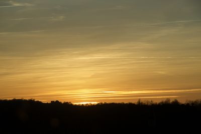 Scenic view of silhouette landscape against sky during sunset