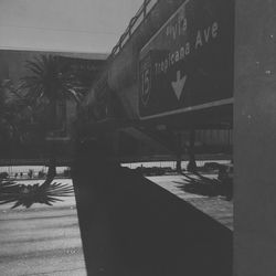 Shadow of man on road