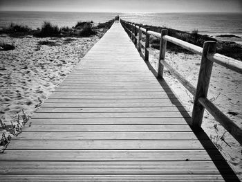 Surface level of wooden pier on beach