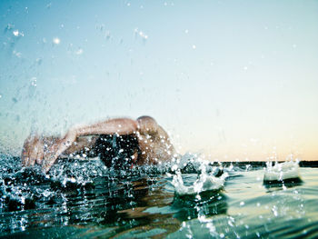 Close-up portrait of man swimming in pool