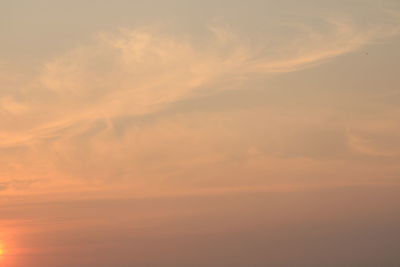 Low angle view of dramatic sky during sunset